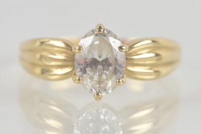 Lot 1356 - A 9ct yellow gold dress ring, with claw set...