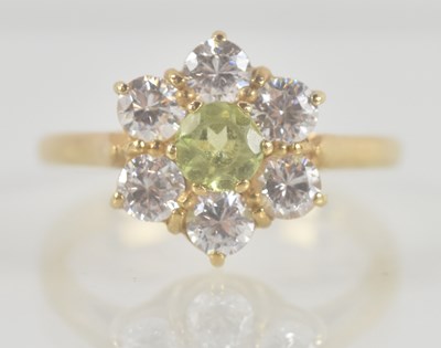 Lot 1357 - A 9ct yellow gold floral cluster dress ring,...
