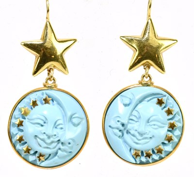 Lot 1496 - An unusual pair of carved turquoise and yellow...