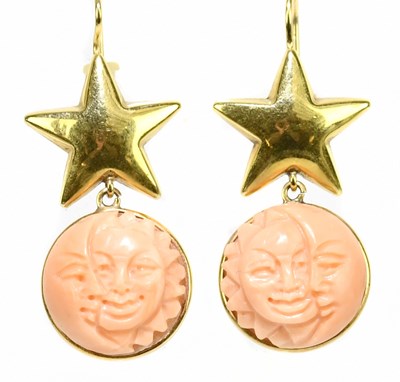 Lot 1495 - A pair of unusual carved coral and yellow...