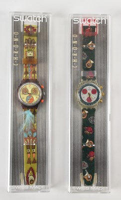 Lot 1647 - SWATCH; two limited edition cased watches,...