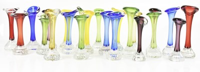 Lot 1438 - A collection of decorative art glass vases by...