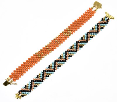 Lot 1251 - A coral and yellow metal bead bracelet, the...