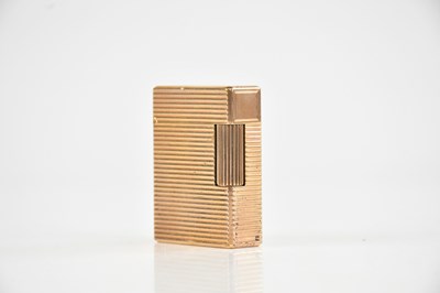 Lot 1139 - S J DUPONT; a gold plated lighter, in box (af).