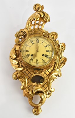 Lot 369 - A Swedish giltwood cartel wall clock, the dial...
