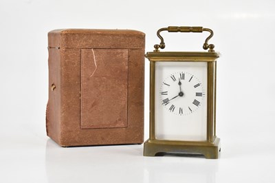 Lot 2186 - A French brass cased carriage clock, with...