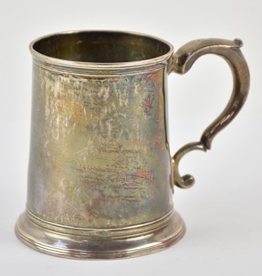 Lot 1228 - A George III hallmarked silver mug, London...