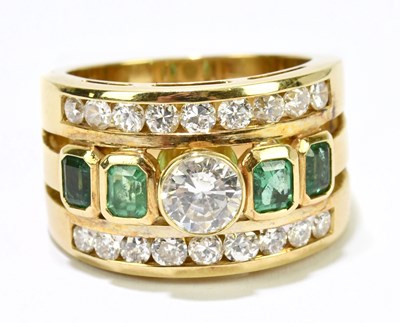 Lot 1012 - A yellow metal diamond and emerald three band...