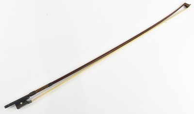 Lot 1304 - A silver mounted German violin bow, stamped ‘F...