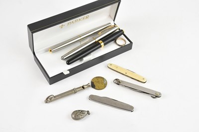 Lot 2299 - A group of three Parker fountain pens, a...