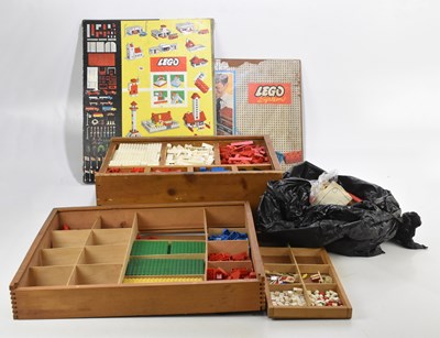 Lot 421 - Two wooden chests containing vintage Lego.