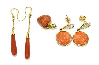 Lot 1493 - Two pairs of yellow metal mounted carved coral...