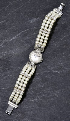 Lot 1664 - ARSA; an Art Deco designed white metal diamond...