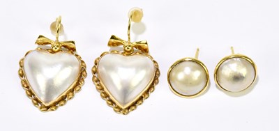 Lot 1497 - A pair of yellow metal and heart shaped drop...