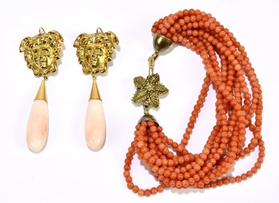 Lot 1504 - A pair of angel skin coral and yellow metal...