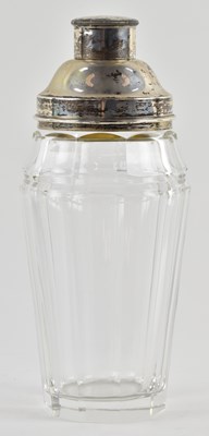 Lot 1242 - A 1920s Art Deco cut glass and silver topped...