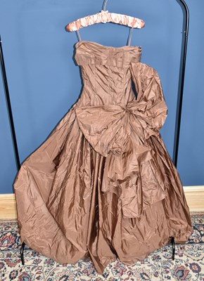 Lot 837 - CHRISTIAN DIOR, LONDON; a full length brown...