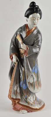 Lot 1052 - A large 19th century porcelain figure of a...