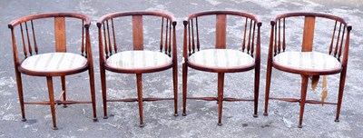 Lot 1597 - A set of four Edwardian stained beech and line inlaid tub chairs