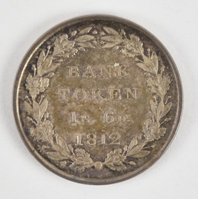 Lot 1593 - A George III 1812 silver bank token to the...