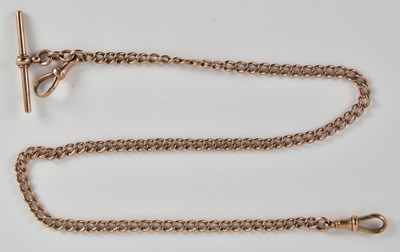 Lot 1279 - A 9ct rose gold pocket watch chain, with T-bar...