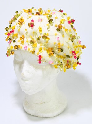Lot 793 - CHRISTIAN DIOR, PARIS, NEW YORK; a 1950s cream...