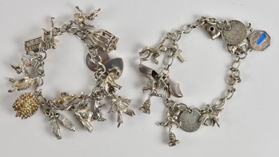 Lot 1486 - A 925 silver charm bracelet including...