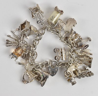 Lot 1487 - A 925 silver charm bracelet including elephant,...