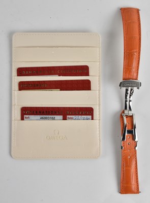 Lot 1630 - OMEGA; an orange leather Omega Seamaster and...
