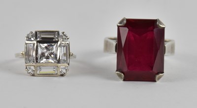 Lot 1353 - An 800 grade silver and ruby set dress ring,...