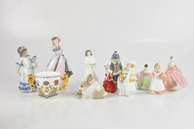 Lot 1309 - ROYAL DOULTON; a collection of six figures...