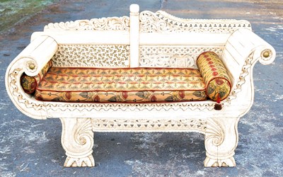 Lot 1736 - An Eastern cream painted hardwood sofa