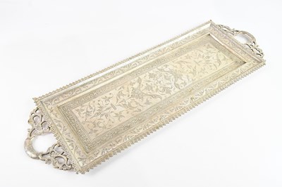 Lot 77 - A large Indian white metal twin handled...