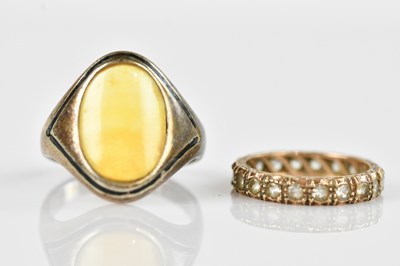 Lot 2599 - A yellow metal full eternity ring, set with...
