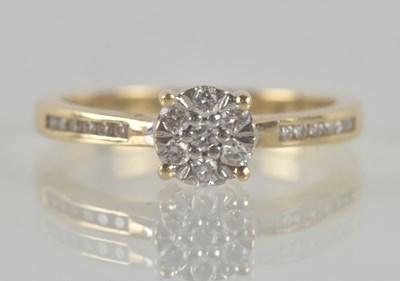Lot 1317 - CYNTHIA FINDLAY; a 9ct yellow gold diamond set...
