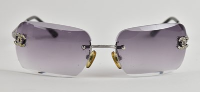 Lot 463 - CHANEL; a cased pair of 'Coco Chanel' lady's...