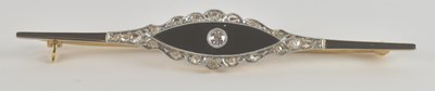 Lot 1439 - YOUNG STEPHEN; an 18ct yellow gold onyx and...