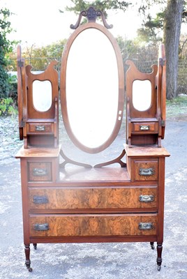 Lot 1675 - A late Victorian walnut dressing chest with triple mirror back