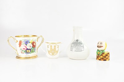 Lot 1251 - Two loving cups, one Royal Doulton example, an...