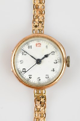 Lot 530 - A 9ct gold lady's wristwatch, the enamel dial...