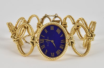 Lot 1608 - BAUME & MERCIER; a stylish 18ct yellow gold...