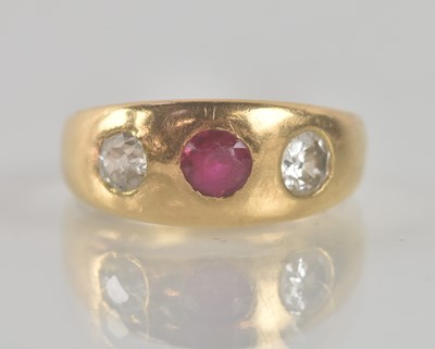 Lot 1316 - An antique yellow metal ruby and diamond three...