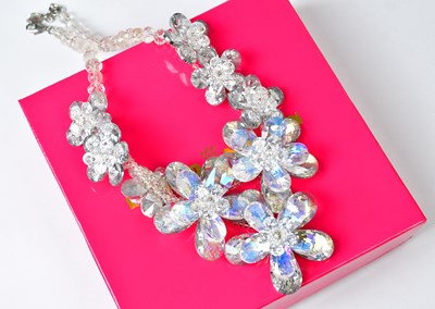Lot 727 - BUTLER & WILSON; a large crystal beaded...