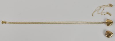 Lot 1404 - Two 9ct yellow gold heart shaped locket...