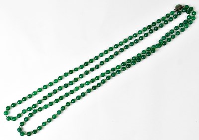 Lot 716 - A single-strand green chalcedony beaded...