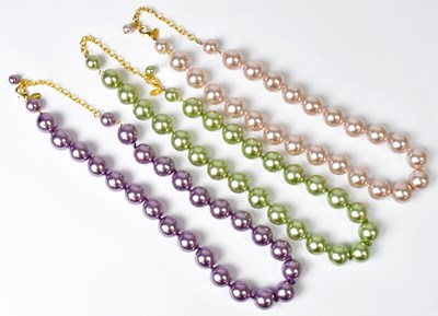 Lot 737 - JOAN RIVERS; three single-strand coloured faux...