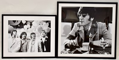 Lot 436 - THE BEATLES; two large black and white prints,...