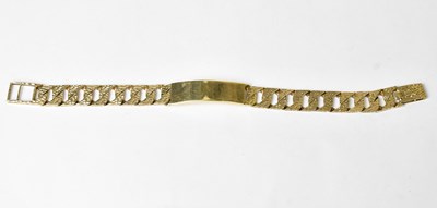 Lot 862 - A 9ct yellow gold chunky ID bracelet with...