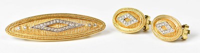 Lot 749 - BURBERRY; a pair of oval gold-coloured clip-on...