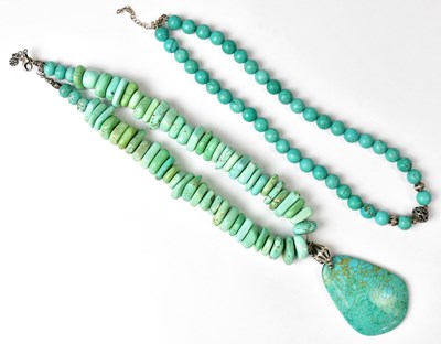 Lot 715 - Two turquoise beaded necklaces, one with a...